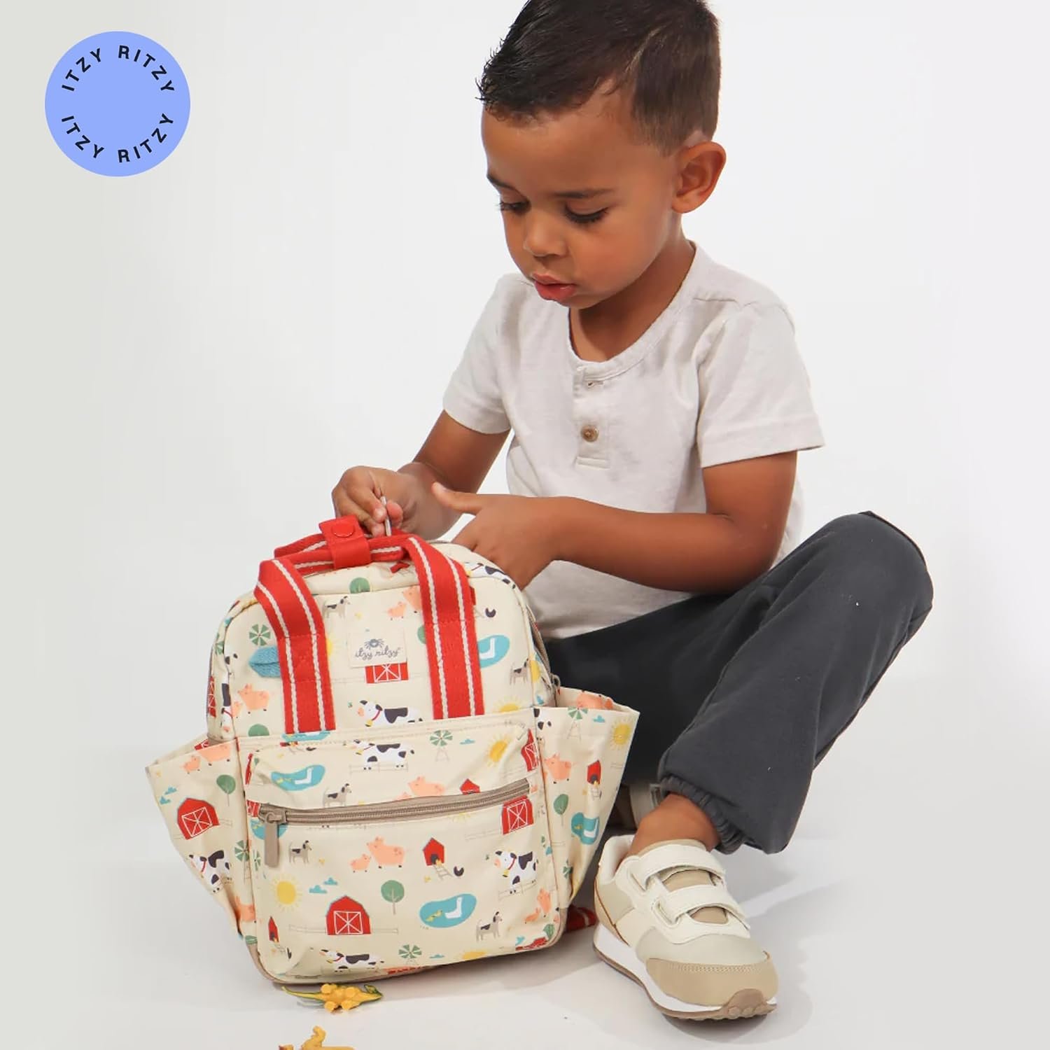Itzy Ritzy Toddler Backpack, Baby Daycare Bag w/Spacious Interior (Farm) | Adjustable Straps, Wipeable Lining, 2 Side Pockets, Front Zipper, & Name Label - Keeps Essentials Organized for Daily Travel - Image 7